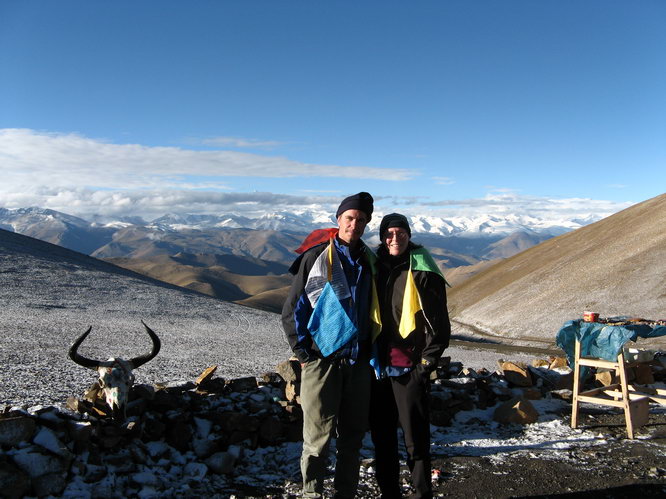 Glenn and Janet wearing the latest prayer flag fashion on the way to Everest.